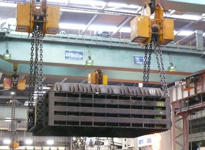 Sand box load turning device