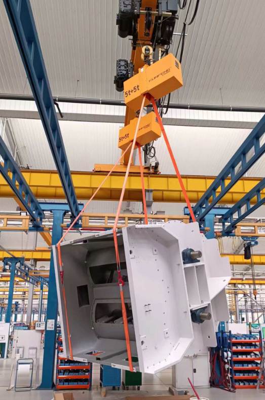 Load rotator for housing component rotation